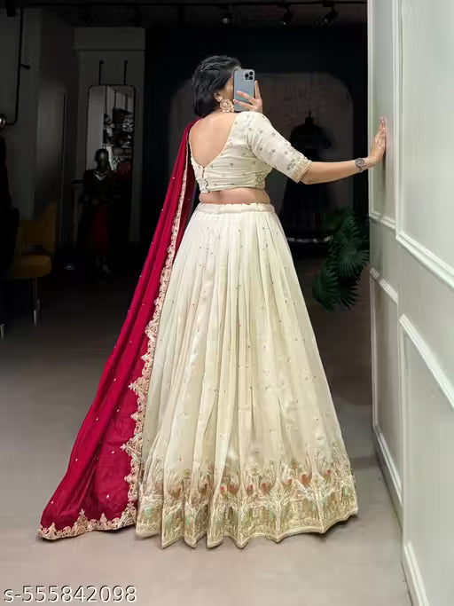 Cream Color Embroidery Work With Silk Lehenga Choli
